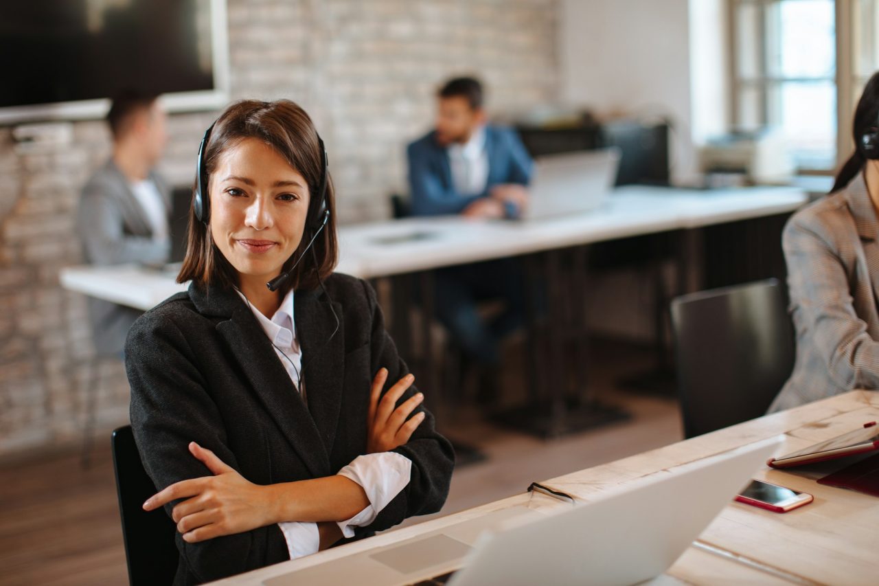 young-woman-customer-support-posing-in-the-office